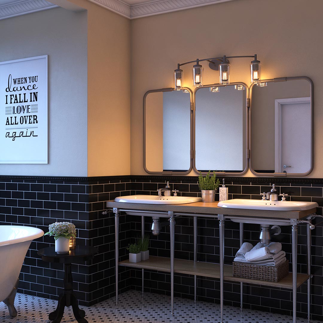 bathroom with 4 light bathroom fixture above vanity mirrors